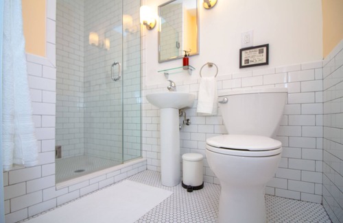 Queens Condo | The High Tide Studio #7 Studio Bedroom Hotel Room by RedAwning