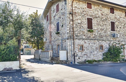 Lazise Apartment | Three-room apartment Lake Garda view wi-fi smart TV air conditioner table on terrace