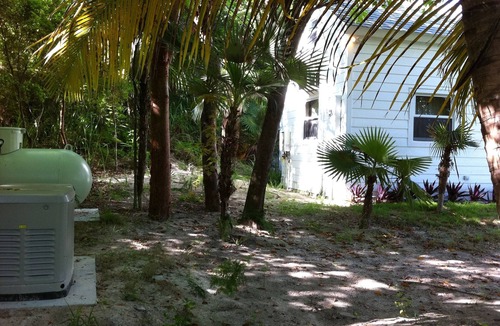 Dunmore Town House | Tiny House Vacation, Bayfront with private beach area! On two secluded acres!