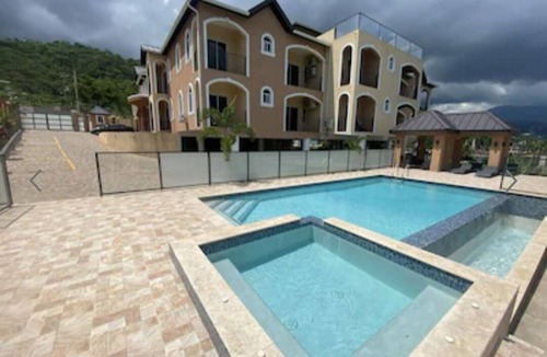 Molynes Gardens Apartment | Tranquil 2 beds 2.5 bath nestled in a Beautiful Neighborhood.
