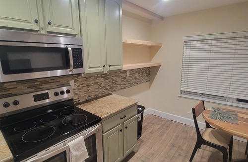 Williams Town Condo | Tranquil and Cozy Space Nestled Steps From The Beach
