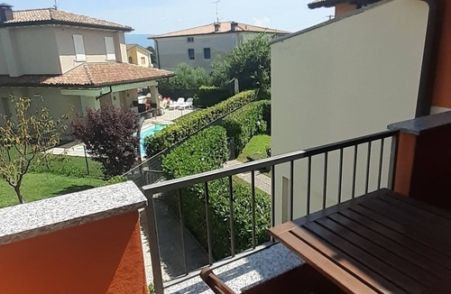 Raffa Apartment | Two-room apartment nestled in the greenery of Lake Garda, with swimming pool and garden