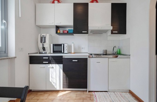 San Lorenzo in Banale Apartment | Vacation Apartment Ciclamino Standard Vittoria with Mountain View, Wi-Fi & Garden