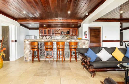 Tower Isle Apartment | Wake up to panoramic ocean views & relax by your own private jetty steps away.n