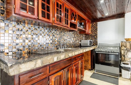 Tower Isle Apartment | Wake up to panoramic ocean views & relax by your own private jetty steps away.n
