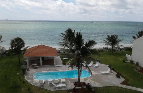 Williams Town Condo | Your oceanfront row seat to a spectacular nature show!