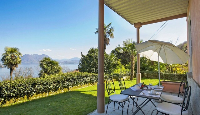 2-room corner apartment with terrace and garden in an Art Nouveau villa with communal pool