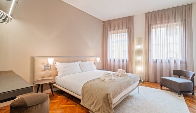 GuestHost - Exclusive apartment perfect for 4 guests located in the very center of Padua, in the luxury shopping street, immersed in the magic of the squares, a stone's throw from the Scrovegni Chapel, the Bo, the Palazzo della Ragione, the Duomo and 1