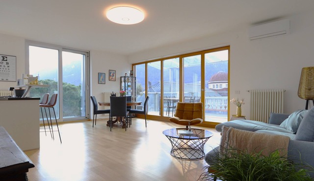 Merano center penthouse with terrace, garage, bike room and infrared sauna.