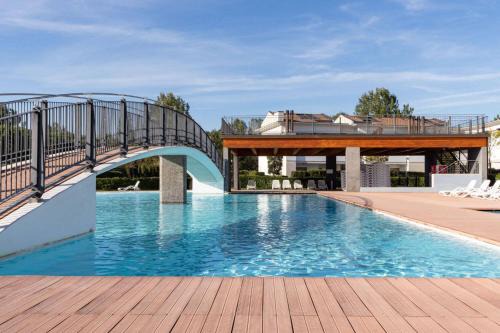 Relax by the pool in this modern flat