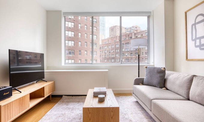 Sutton Place Apartment | Airy Midtown East 2BR w/Gym, Doorman & W/D, nr Parks, by Blueground