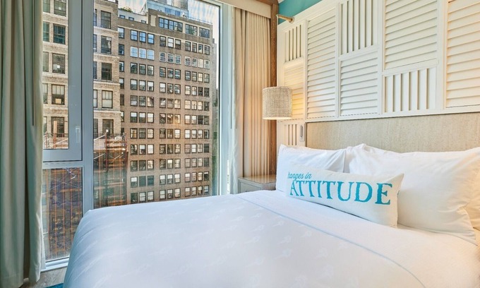 Midtown Hotel | Deluxe Room One King Bed at Margaritaville Resort Times Square