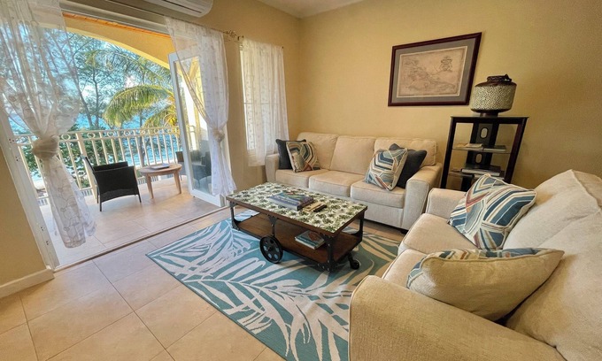 Nassau Condo | NEW Beachfront Condo, 5 minutes from airport and 2 mins away from Caves Village.