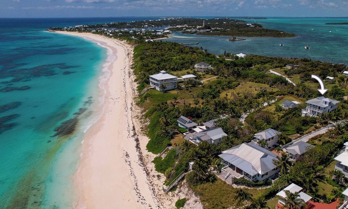 Hope Town Cottage | Tipowin Beachfront, Dock with Ocean & Bay Views
