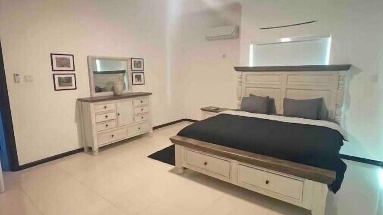 Photo of Bedroom in Molynes Gardens