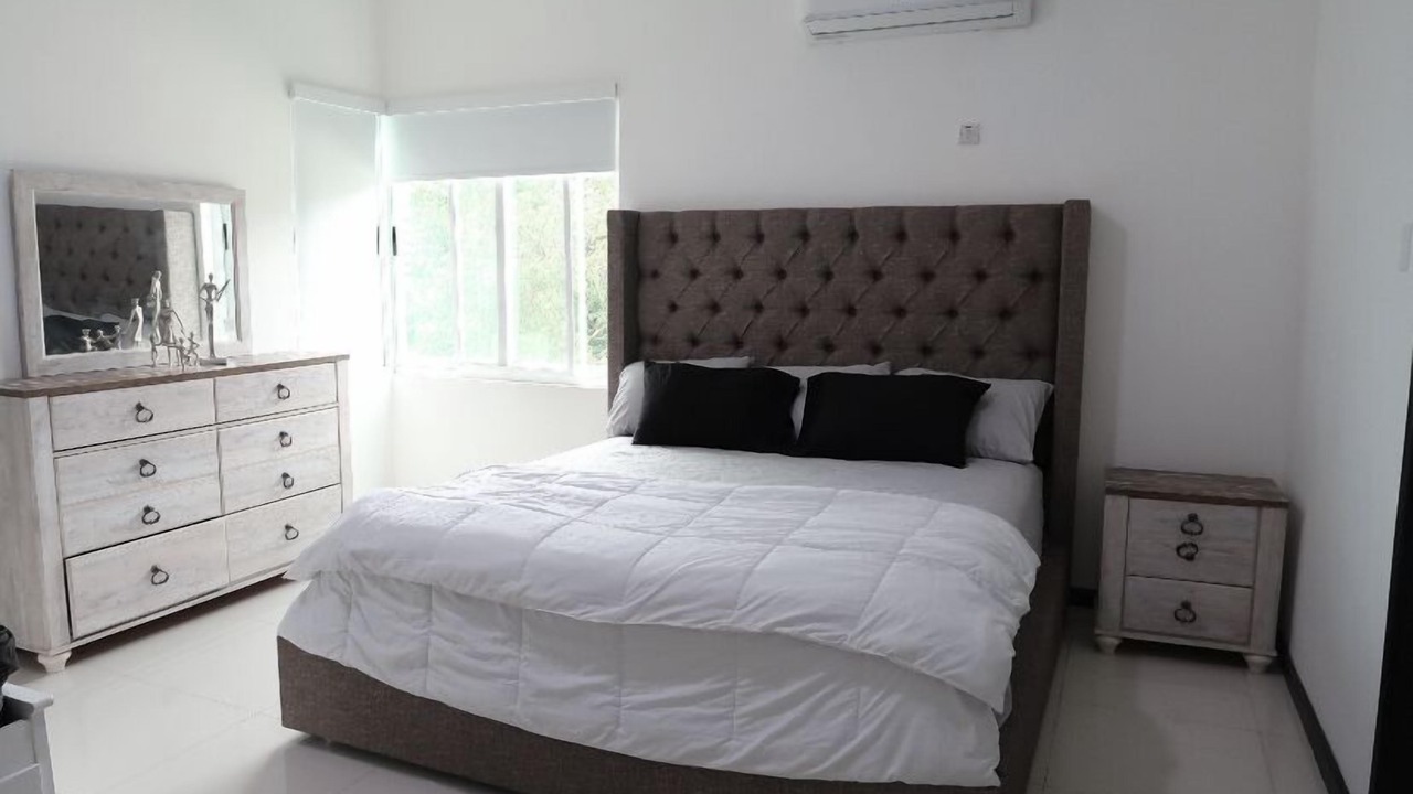 Photo of Bedroom in Molynes Gardens